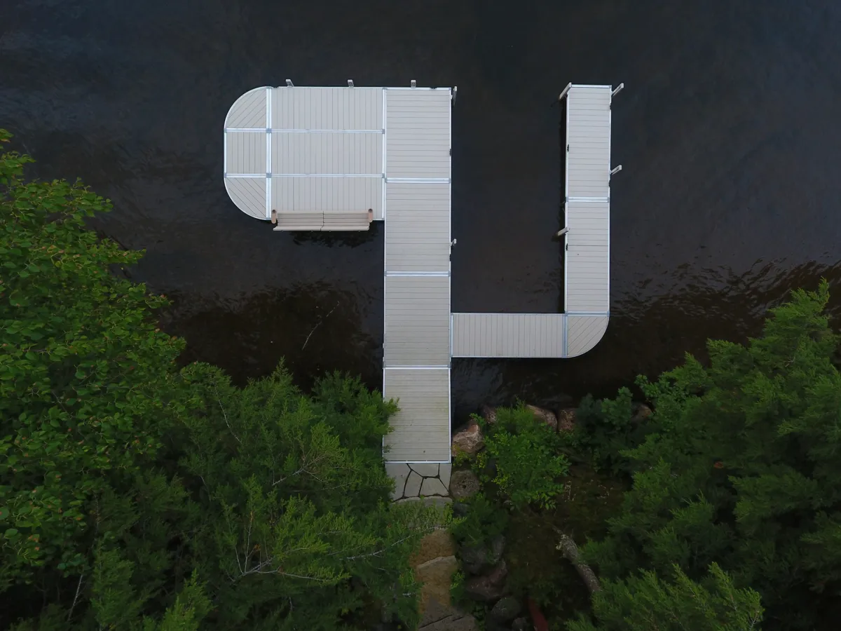 Overhead view of RS4 tan aluminum 6ft dock sections with integrated double bench