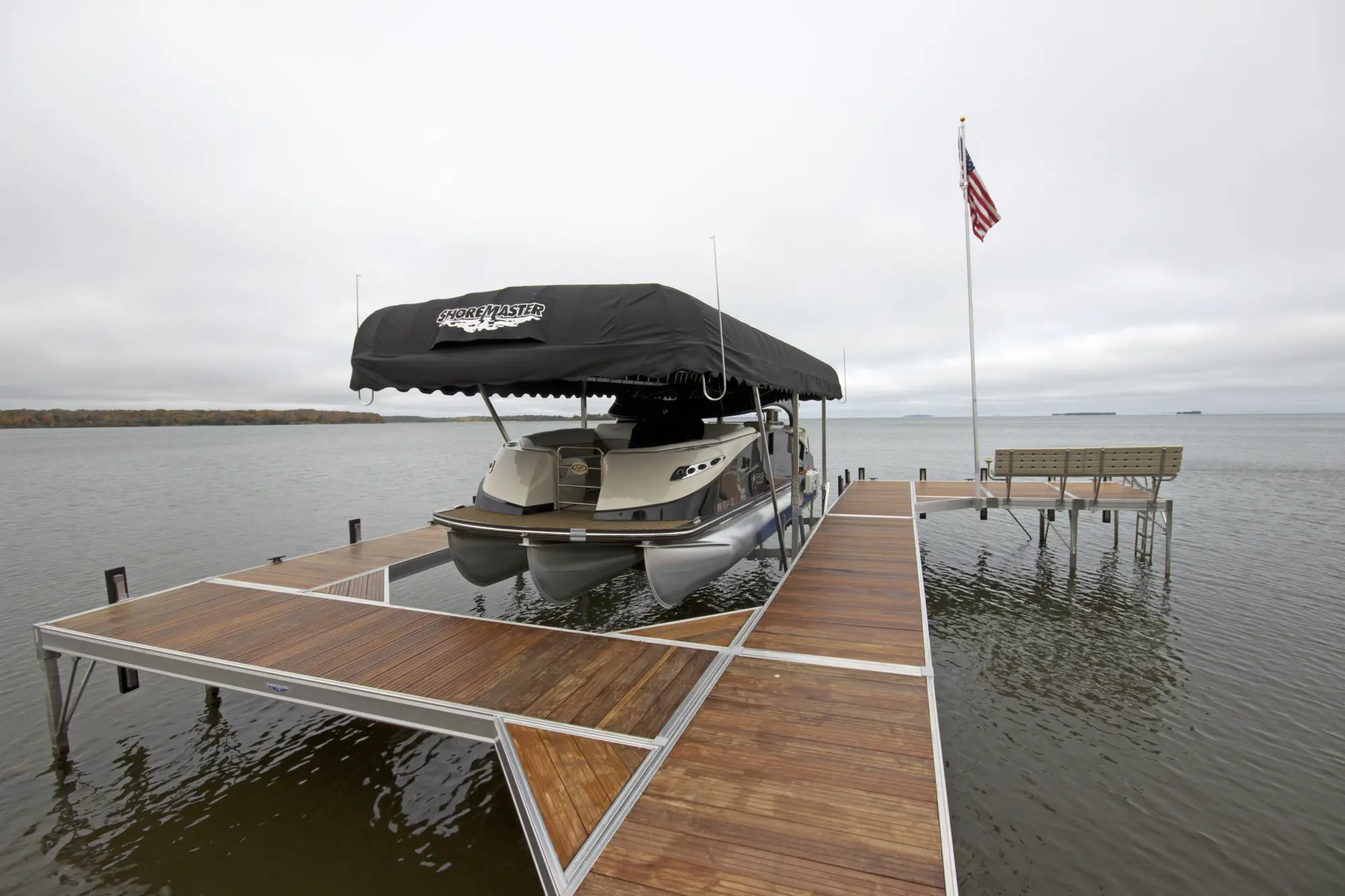 ShoreMaster Infinity RS7 dock with vertical lift and black canopy